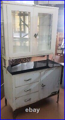 Antique Steel Step Back Medical Cabinet with Bullet Glass & Storage Drawers