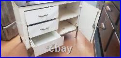 Antique Steel Step Back Medical Cabinet with Bullet Glass & Storage Drawers