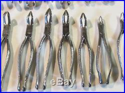 Huge lot of 35 assorted vintage used dental pliers & forceps, stainless steel