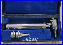 Old laryngological otoscope, medical equipment collectible