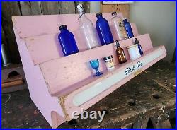 Vintage First Aid Pharmacy Display Unit with Antique Medical Bottles