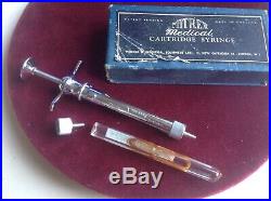 Vintage medical equipment, syringe, needles and other bits, quality 1950's boxed