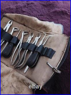 Vintage set of dental equipment in leather case with key, medical history