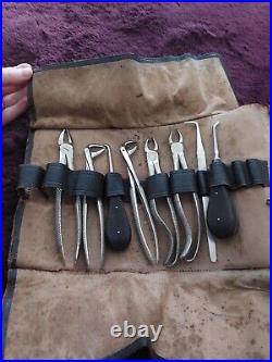 Vintage set of dental equipment in leather case with key, medical history